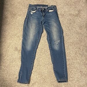 Distressed Levi blue jeans